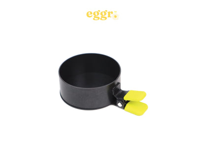 eggr egg cooker with metal non toxic material and a yellow grip handle which opens and closes for your eggs